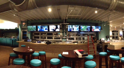 Restaurant/sports bar with multi-media system